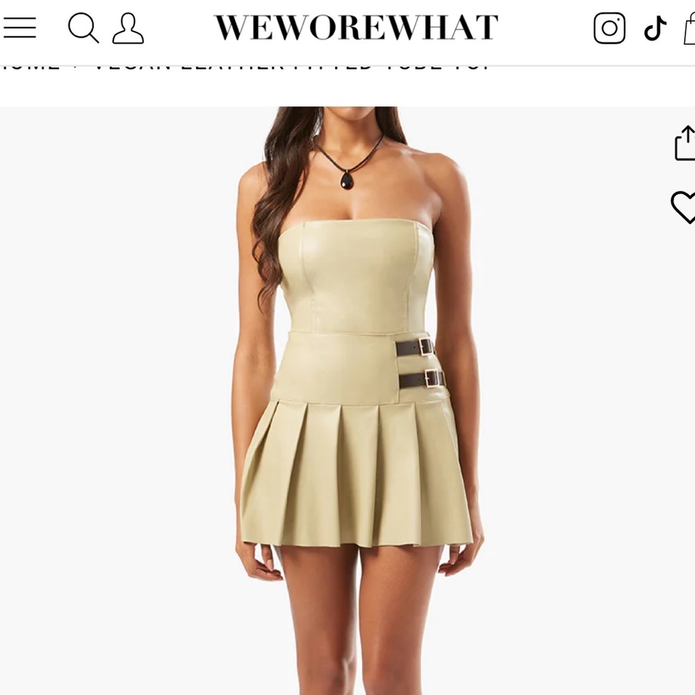 We wore what vegan leather skirt and tube top set. Worn once
